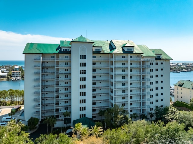 view of building exterior with a water view