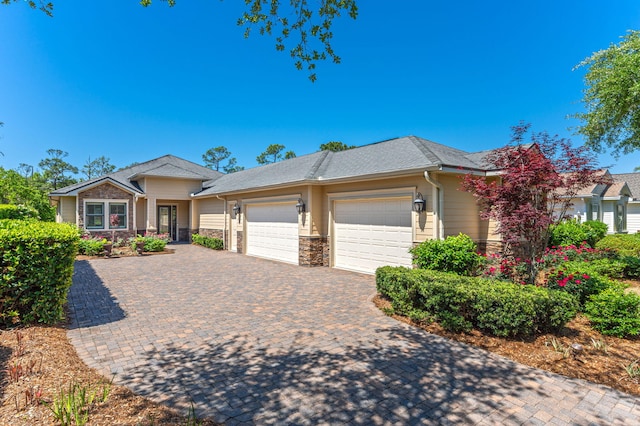 view of front of home with a garage