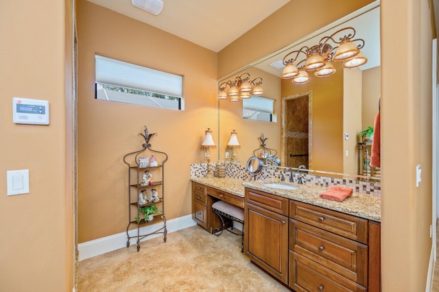 bathroom featuring tile floors and vanity