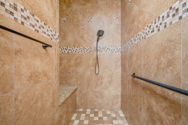 interior space featuring tiled shower