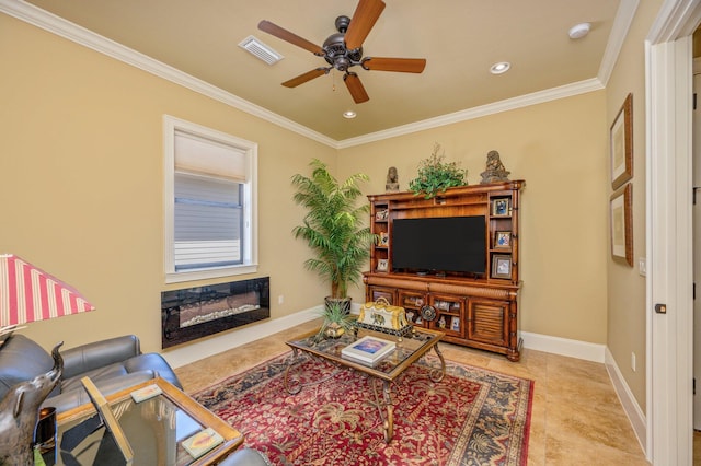 living room with ceiling fan, crown molding, and light tile floors