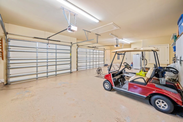 garage featuring a garage door opener