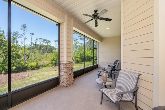 sunroom / solarium with ceiling fan