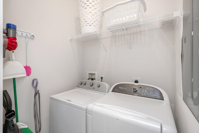 laundry room featuring independent washer and dryer and hookup for a washing machine