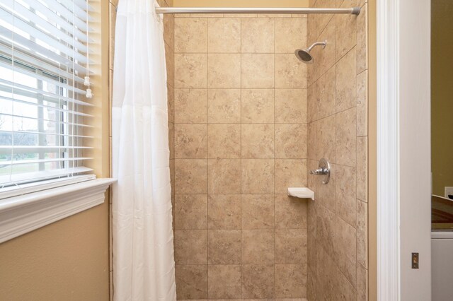 bathroom with curtained shower