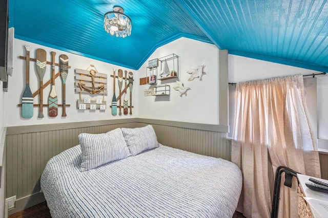 bedroom featuring vaulted ceiling