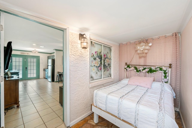 tiled bedroom featuring ornamental molding, stainless steel fridge, french doors, and a chandelier