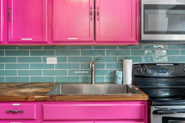 interior details with electric range, tasteful backsplash, and sink