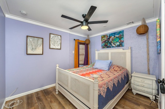 bedroom featuring crown molding, wood-type flooring, and ceiling fan