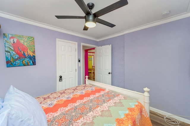 bedroom featuring wood-type flooring, ceiling fan, and crown molding