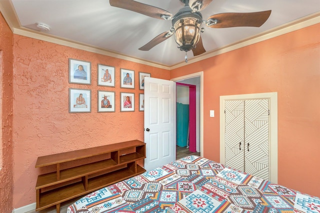 unfurnished bedroom with ornamental molding and ceiling fan