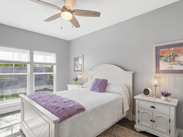 bedroom featuring hardwood / wood-style floors and ceiling fan