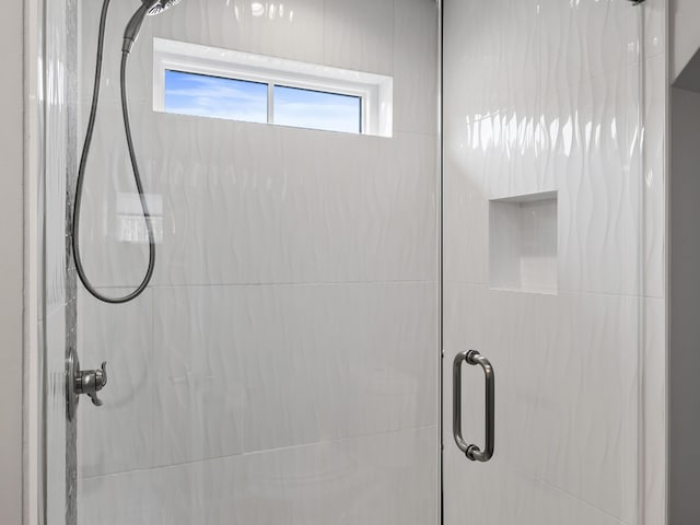 bathroom featuring walk in shower