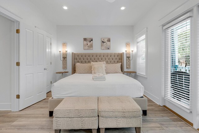 bedroom with light hardwood / wood-style flooring