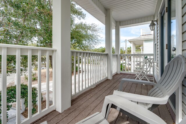 balcony featuring a porch