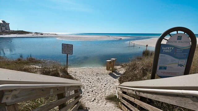 property view of water featuring a beach view