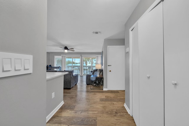 hallway featuring hardwood / wood-style floors