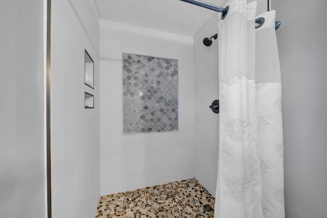 bathroom with curtained shower