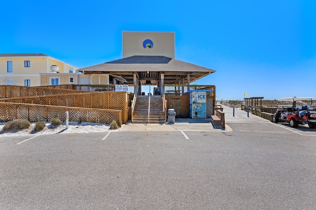 view of front of home featuring a dock