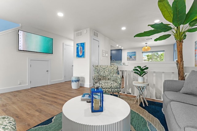 living room featuring light wood-type flooring