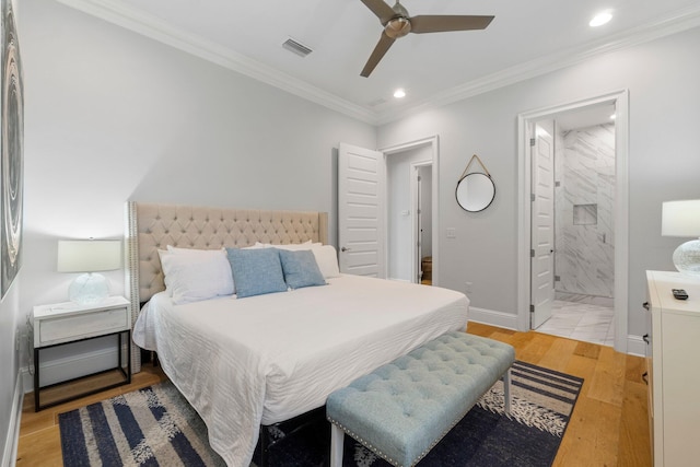 bedroom featuring crown molding, connected bathroom, ceiling fan, and light tile floors