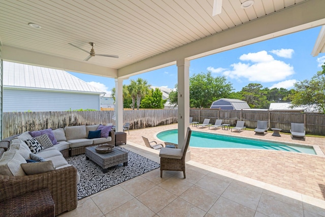 view of patio / terrace with an outdoor hangout area, ceiling fan, and a fenced in pool