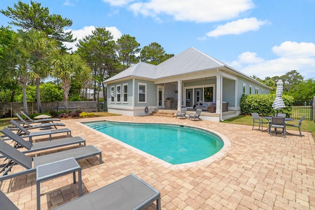 view of pool with a patio and an outdoor hangout area