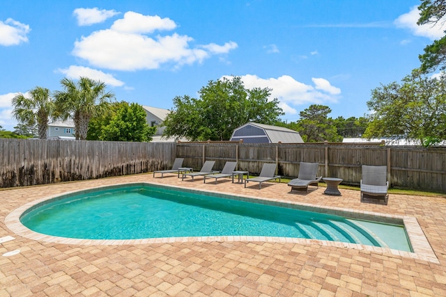 view of pool featuring a patio