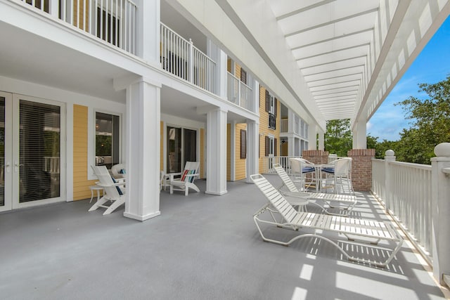 view of patio with a balcony