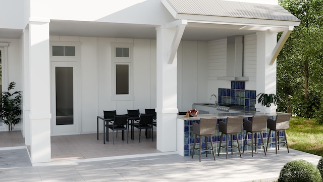 view of terrace featuring an outdoor wet bar