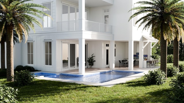 back of house featuring french doors, a balcony, a patio, and a lawn