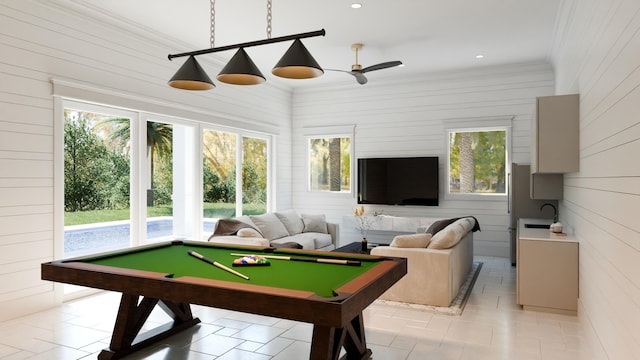 playroom with ornamental molding, ceiling fan, light tile floors, and billiards