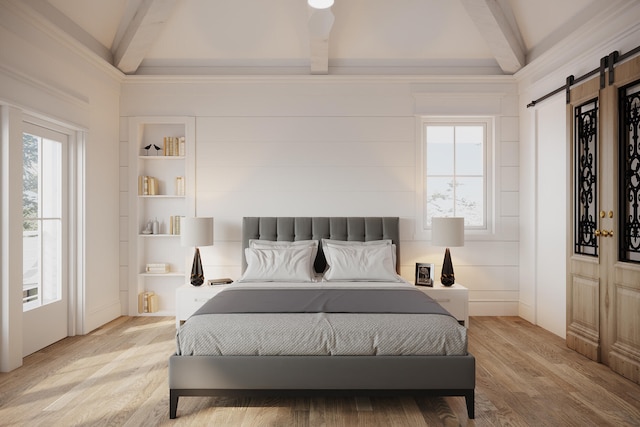 bedroom featuring beamed ceiling, crown molding, light hardwood / wood-style floors, and a barn door