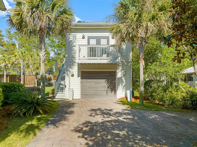 coastal home with a garage