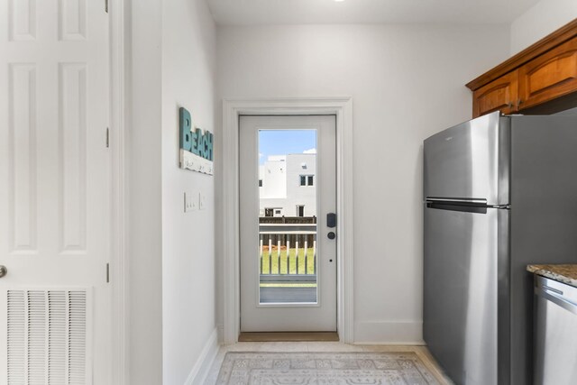 interior space with light tile flooring