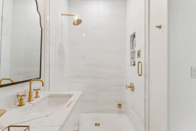 bathroom with an enclosed shower and vanity