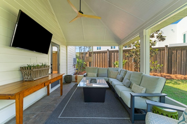 exterior space with outdoor lounge area and ceiling fan