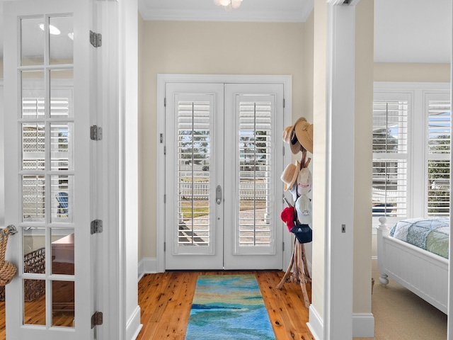 doorway to outside featuring french doors, plenty of natural light, and light hardwood / wood-style flooring