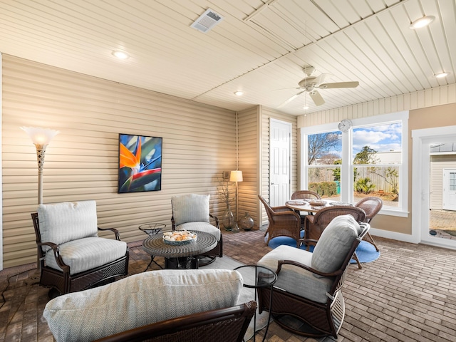 living room with ceiling fan