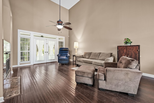 living room with high vaulted ceiling, ceiling fan, french doors, and dark hardwood / wood-style floors