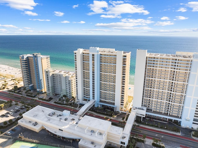 bird's eye view featuring a beach view and a water view