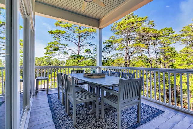 wooden deck with ceiling fan