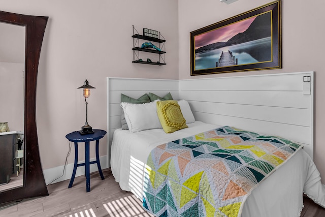 bedroom featuring hardwood / wood-style flooring