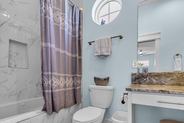 full bathroom featuring vanity, toilet, and shower / bathtub combination with curtain