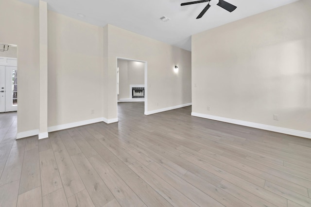 unfurnished room featuring wood-type flooring and ceiling fan