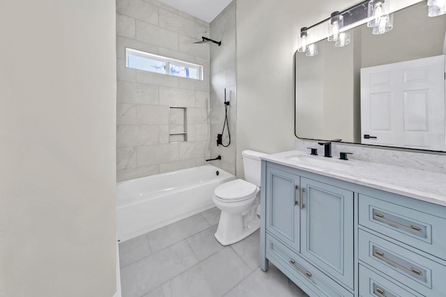 full bathroom featuring vanity with extensive cabinet space, tiled shower / bath combo, tile floors, and toilet