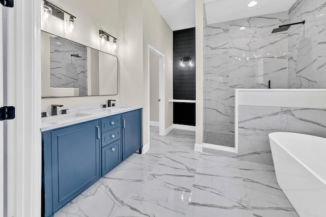 bathroom with dual bowl vanity, tile floors, and a tile shower