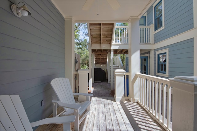 wooden deck with ceiling fan