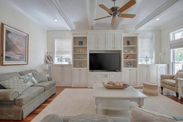 living room featuring ornamental molding, ceiling fan, beamed ceiling, and hardwood / wood-style floors