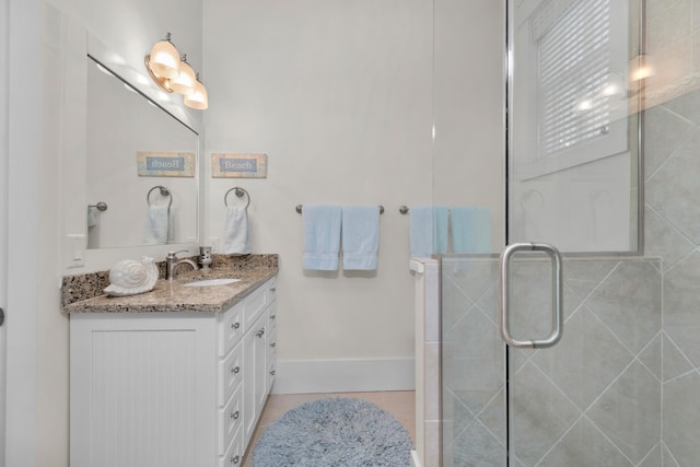 bathroom featuring tile floors and large vanity